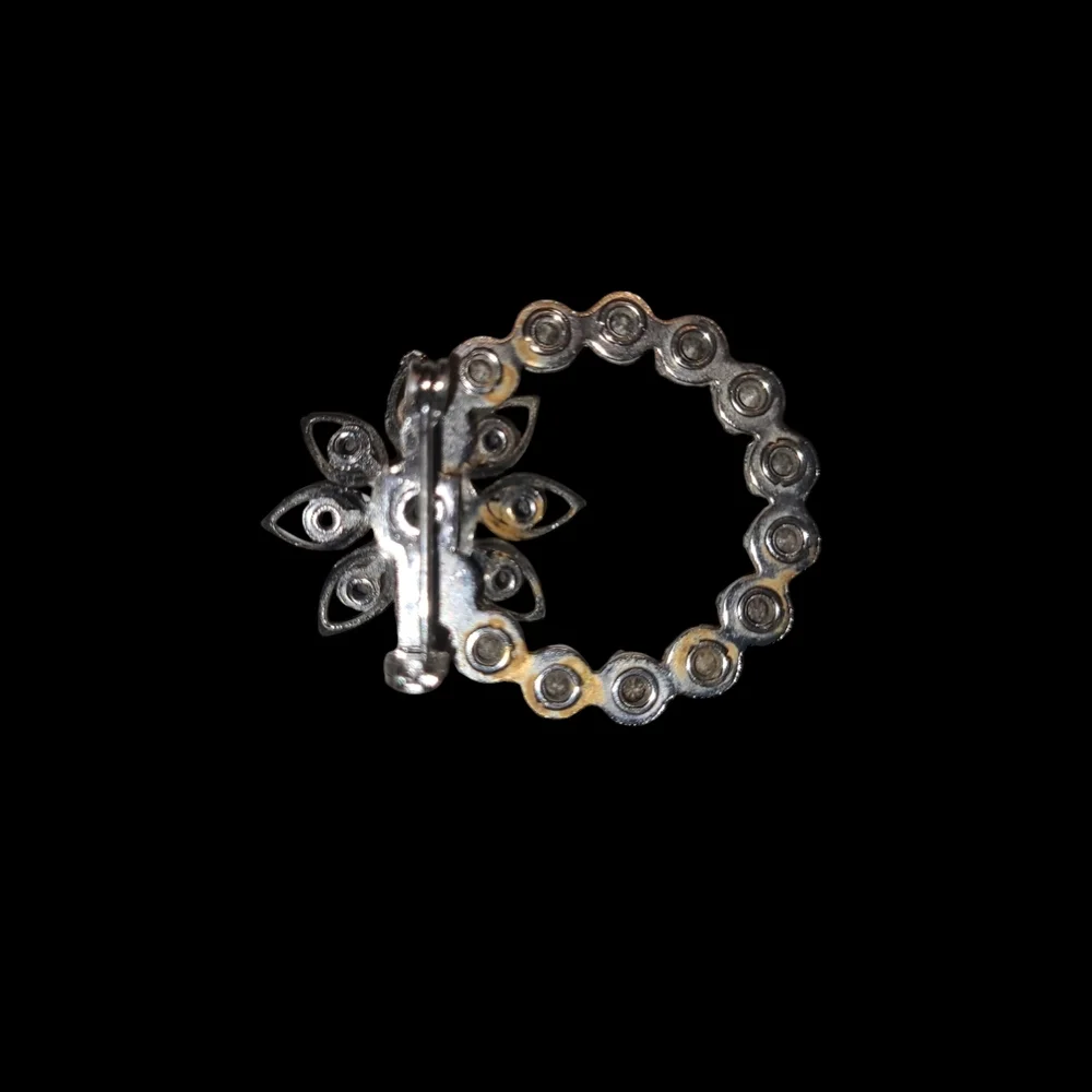 Elegant Silver Floral Crystal Brooch